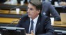 Temer já roubou muita coisa, mas meu discurso não vai roubar, ataca Bolsonaro